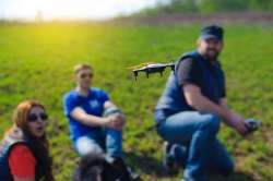 family flying drone