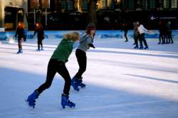 Two Tweens Ice Skating