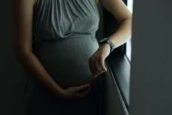overdue pregnant woman