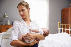 new mother holding baby