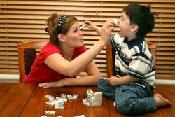 Babysitter and Child Playing