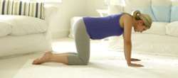 Pregnant woman doing abdominal exercises